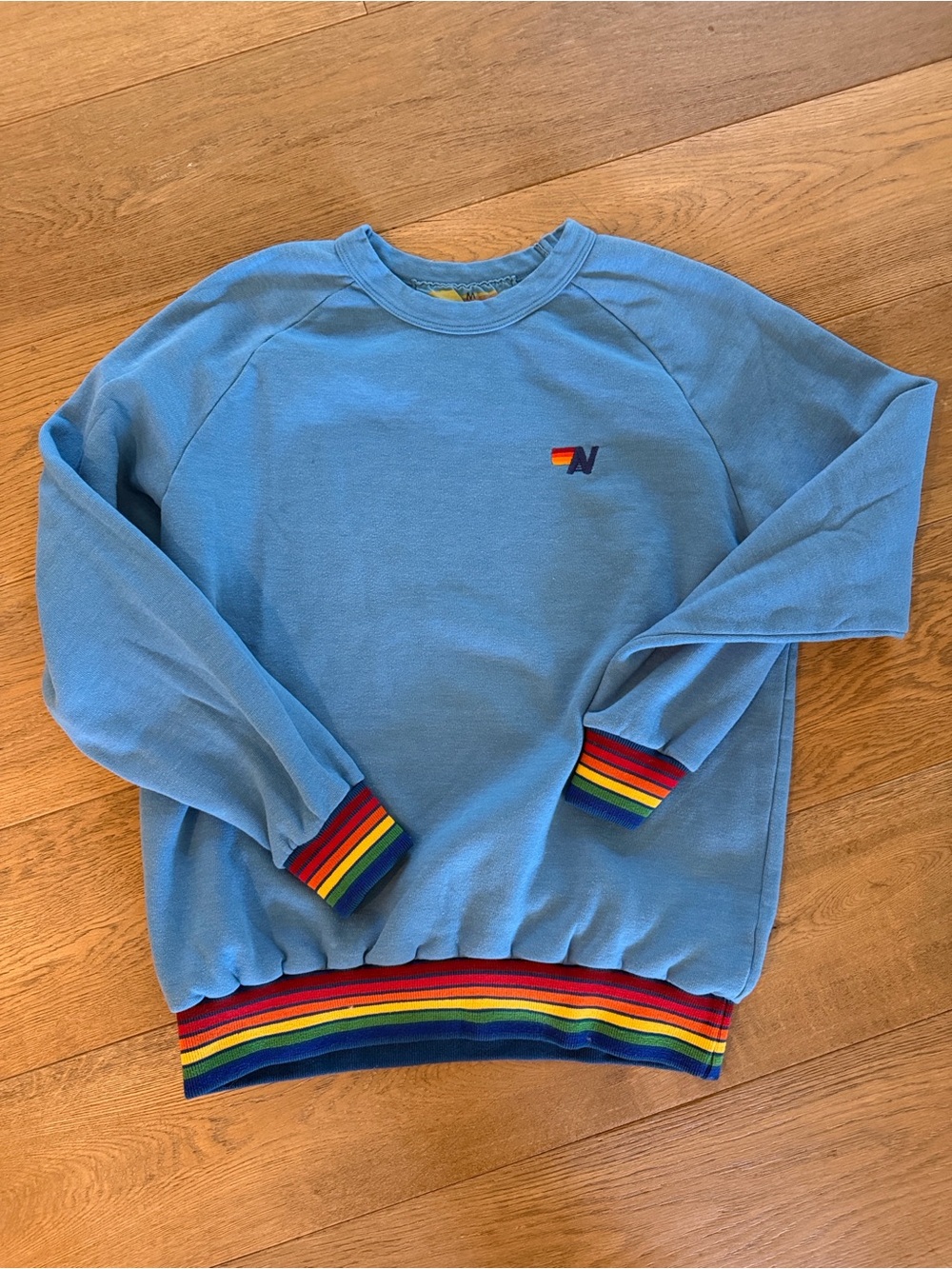 Aviator Nation Crewneck Sweater in the Color Ocean with Rainbow Trim
